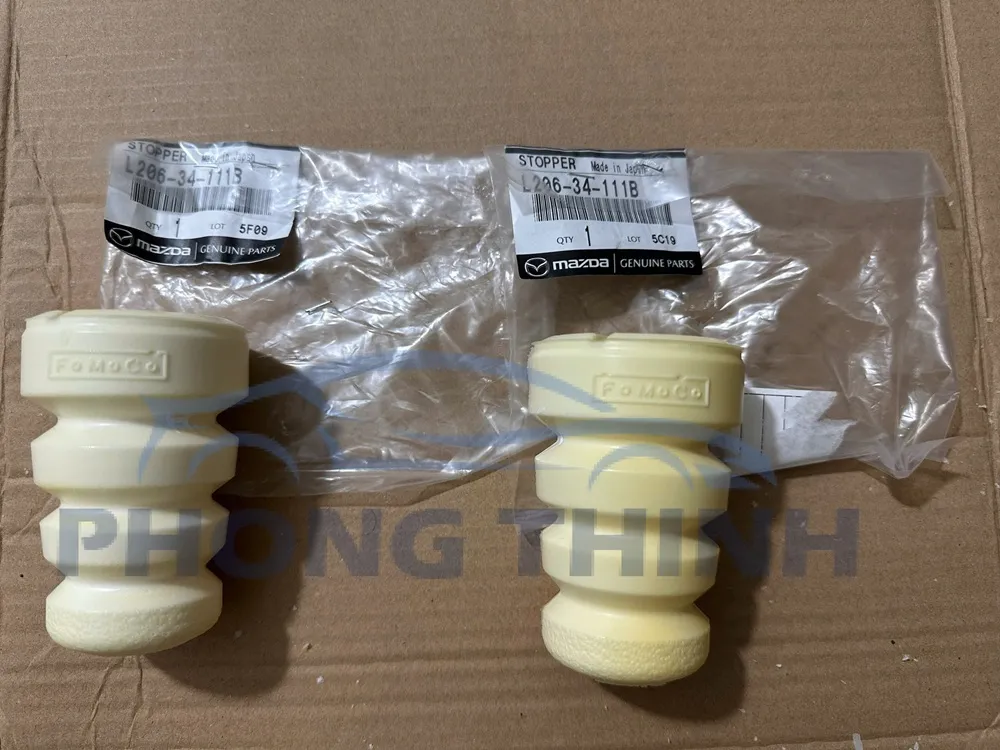 Tăm bông giảm sóc trước Mazda CX9 2011-2017 chính hãng L20634111B