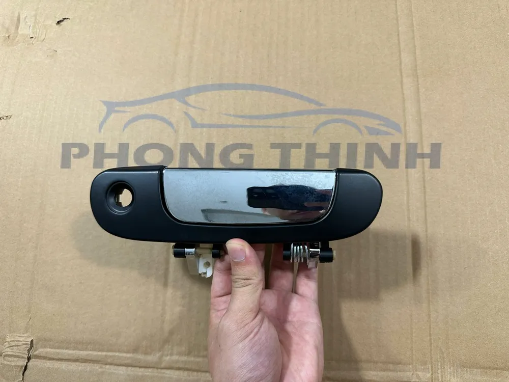 Tay mở cửa ngoài Ford Laser 2001-2005 trước trái LH OEM BVCLX59413CA